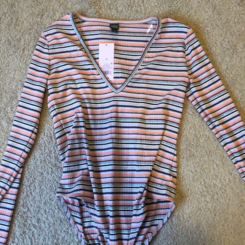 Pink, navy, silver, and purple body suit